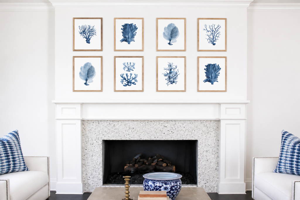 multiple framed prints on the wall How to Arrange Blue Coastal Prints in Your Home