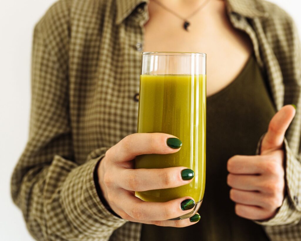 superfood smoothie in ladies hand